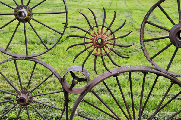 Wagon wheel fence at the Dahmen Barn, Uniontown, Washington, Palouse Country.  The fence is made from over 1,000 antique wagon and tractor wheels. The Dahmen barn was built in 1935 is now home to artists' space.