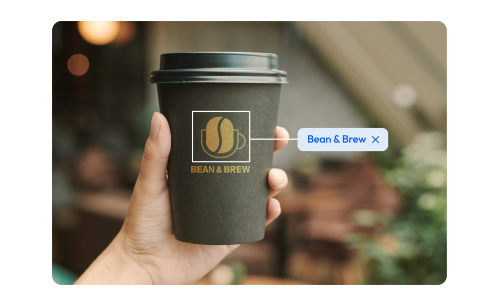 A cup of coffee from Bean & Brew automatically tagged with AI metadata.