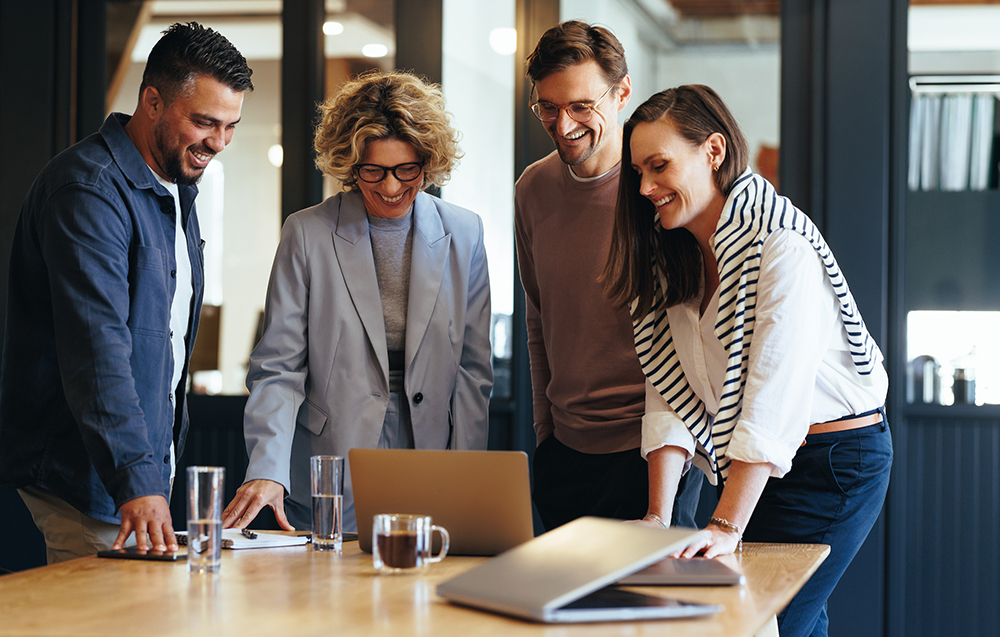 people working together on digital asset management in office