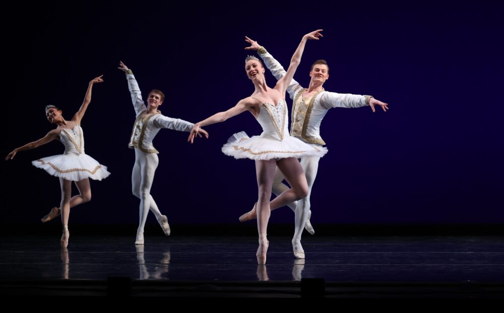 Texas Ballet Theater dancers performing Violin Concerto on stage in white costumes